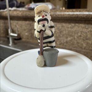 This is a Striper Homies Clown figurine. It is part of the Homies collectible